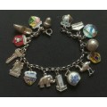 MIX STERLING SILVER AND DUTCH SILVER CHARM BRACELET 180MM 25 GRAMS