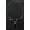 STERLING SILVER  AND BLACK GLASS NECKLACE 500MM 45 GRAMS