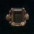 9CT GOLD AND TOPAZ DRESS  RING  SIZE N  TOTAL WEIGHT  5.07 GRAMS TOPAZ 15X10MM