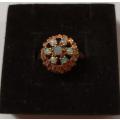 9CT GOLD RING WITH OPALS SIZE O 3.9 GRAMS