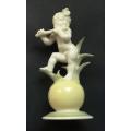 HUTSCHENREUTER GERMANY FIGURE ON BALL PLAYING FLUTE 95X40MM