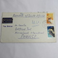 Airmail cover from Schmolln, DDR to Paarl, South Africa with airmail tag and Par Avion ink cancel