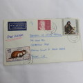 Airmail cover from Schmolln, DDR to Paarl, South Africa with Airmail tag and Par Avion ink cancel