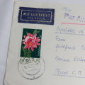 Airmail cover from Schmolln, DDR to Paarl, South Africa with airmail tag and Par Avion ink cancel