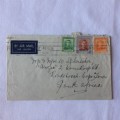 Airmail cover from Hastings, New Zealand to Cape Town, South Africa with 3 New Zealand stamps - 1950