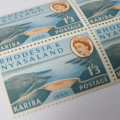 Rhodesia and Nyasaland SACC No. 36 - block of 4 mint stamps with downward shift of orange printing