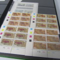 Decent 32 page stamp album with South West Africa control blocks, sheets and stamps