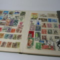 16 Page Stamp album with about 420 world stamps