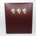 The Royal coats of arms of the Kings and Queens of England 22kt Gold stamps in ledger