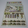 South West Africa Lot of 3 folders with about 100 SWA mint stamps