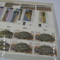 South West Africa Lot of 3 folders with about 100 SWA mint stamps