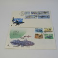 Lot of 12 postal items with fish