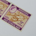 Lot of 2 Rhodesia and Nyasaland 1959 Definitive Issue SACC 25 mint stamps - hinged