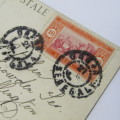 Senegal postcard to England with a Senegal stamp and two unclear cancellations