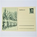 German Post card Showing troops with Hitler stamp on Post card