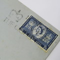 Postal cover from England to Cornwall with 1953 Coronation stamp and unclear roller cancellation