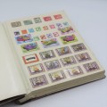 Stamp album with over 1100 stamps - Mint and used