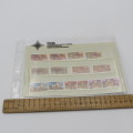 Lot of 9 folders with more than 200 SWA mint stamps
