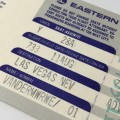 Pair of EASTERN Airways tickets with boarding passes attached - one to Las Vegas and one to Atlanta