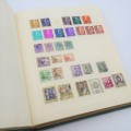 Stamp album with over 1400 stamps including South Africa, China, Switzerland, Britain ect