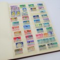 Decent stamp album with almost 1000 stamps - Many of them better value stamps