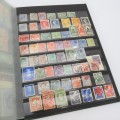 16 page stamp album with well over 400 stamps - Many of them older, scarcer stamps