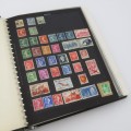 Stamp album with more than 1750 world stamps - Mostly used