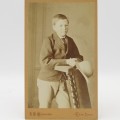 Turn of the century photo of a young man taken by SB Barnard of Cape Town