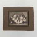 Antique photo of a Grandfather with 11 grandchildren