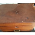Wooden box with secret compartment filled with a mix or internation coins and costume jewellery