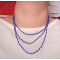 Three string purple beads necklace