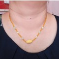 Yellow beads necklace
