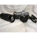 Vintage Minolta SRT303 c/w 50mm Lense + Bushnell Automatic 1:3,5 1200mm Lense