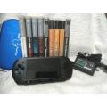 PSP Street, 512MB Memory Card Charger, Carry Case, 5 Games + 4 UMD Music videos