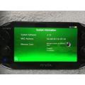 Sony PSVITA PCH1004 c/w Charger + charging cable - no memory card