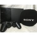 PS2 - Black Slim Line Console c/w 1x New Generic Controller, Cables + 5 Games in Sony Pouch