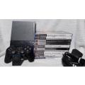 Playstation 2 - Black Slim Line Console c/w Original Controller, AV Cable PSU, Mem Card & 10 Games