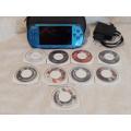 PSP 3004, No memory Card, Charger, 5 Games + 4 UMD Music videos + carry bag - see description