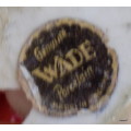 Genuine Wade Porcelain Made in England Pekingese Dog - One foot is damaged.