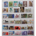 GB - Mixed lot of 31 stamps (some on paper and some hinged)