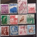 Japan - Mixed Lot of 12 Used Hinged stamps