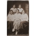 Vintage Postcard Portrait - Family  Group (  Someone holding the person in the middle )