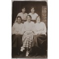 Vintage Postcard Portrait - Family  Group (  Someone holding the person in the middle )