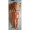 Doll with fixed legs