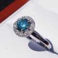 Superb 0.90ct Fancy Vivid Greenish Blue Diamond Halo Engagement Ring Set in Platinum