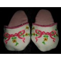 Embroidered slippers for a baby