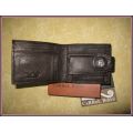 Man's wallet. Genuine leather. Carrol Boyes in original box.