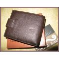 Man's wallet. Genuine leather. Carrol Boyes in original box.