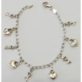 Cute Sterling Silver Charm Bracelet with 9 Silver Charms
