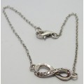 A Fine Sterling Silver Bracelet Chain with Figure 8 Set with CZ's